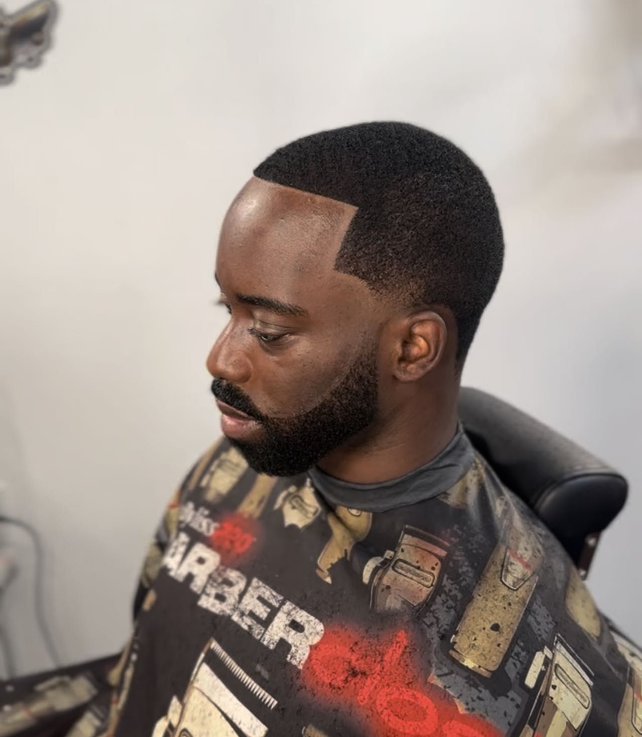 Clean taper haircut at AxellCuts Harlem