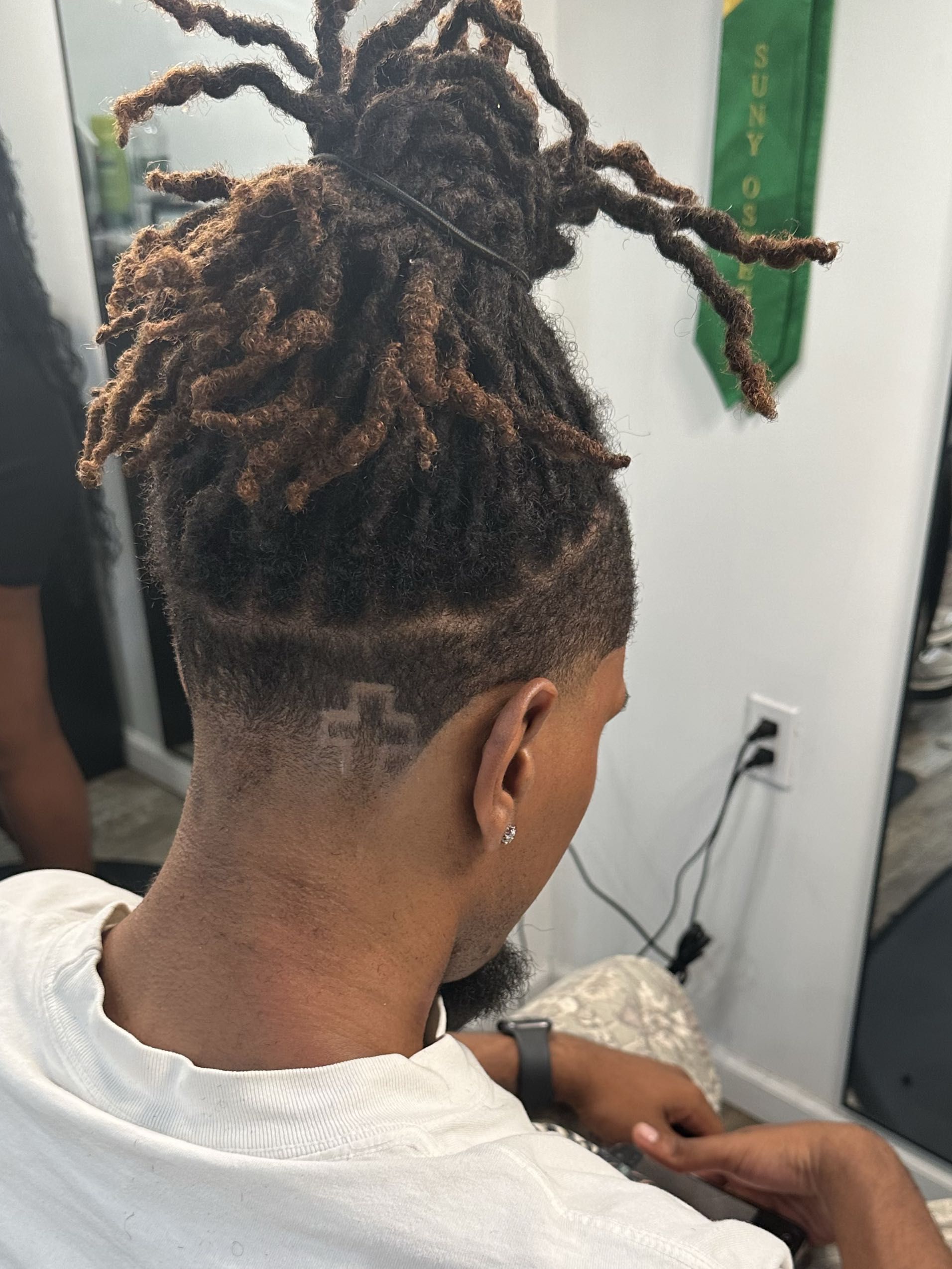 Waves haircut by AxellCuts barbershop Harlem